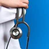 zoomed in doctor with a stethoscope
