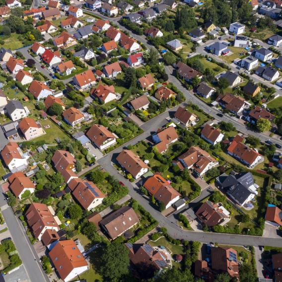 Aerial view above suburb houses