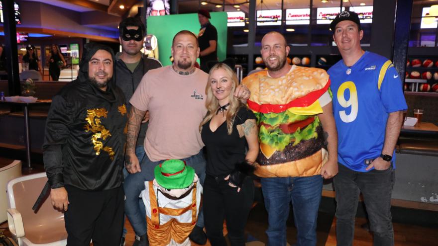 Group in costume posing for a picture