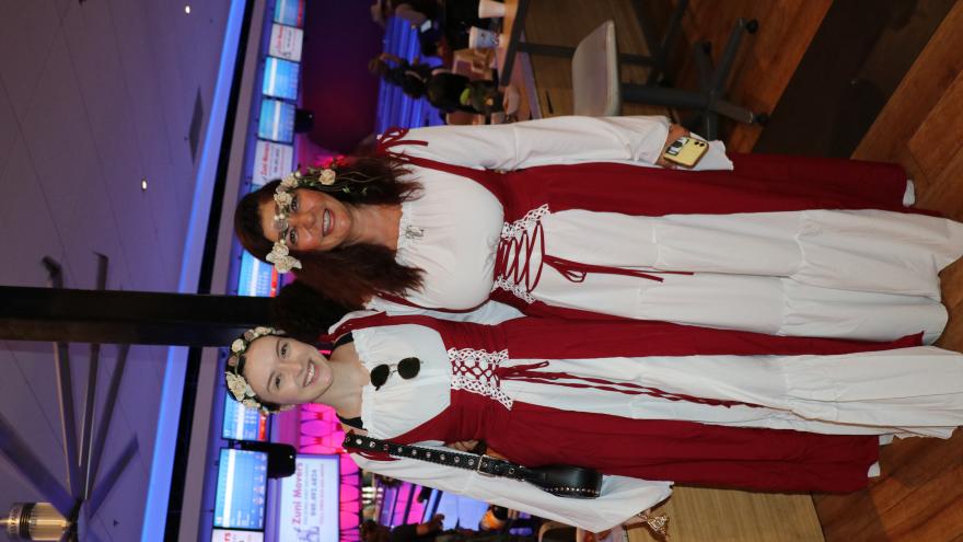 Group of bowlers in costume posing for a picture
