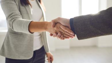 close up for two people shaking hands